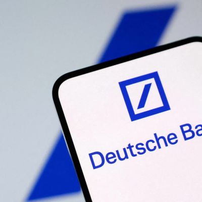 Deutsche Bank posts biggest annual profit in nearly two decades a day after police search