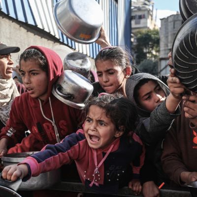 Israel to ban more than 30 aid groups operating in Gaza  —  RT World News