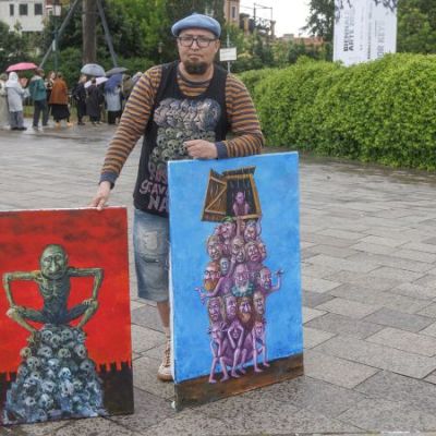 Exiled Russian artist known for anti-Putin cartoons shot dead in Poland | CNN