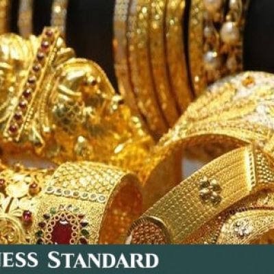 Gold drops over 1% as thin trading, profit-taking weigh