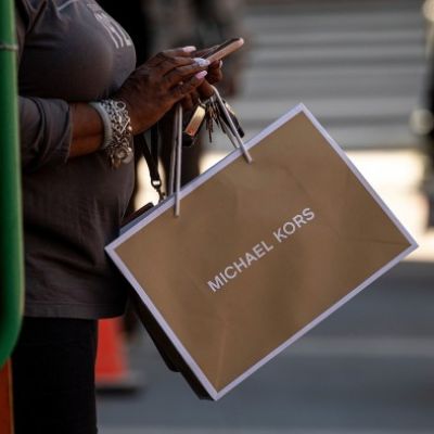 American luxury deal's collapse leaves Michael Kors in limbo