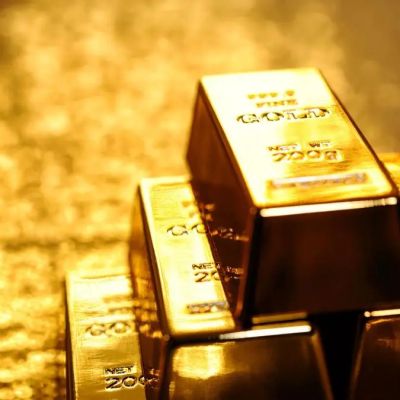 Gold slips to two-week low as Fed rate-hike bets buoy dollar