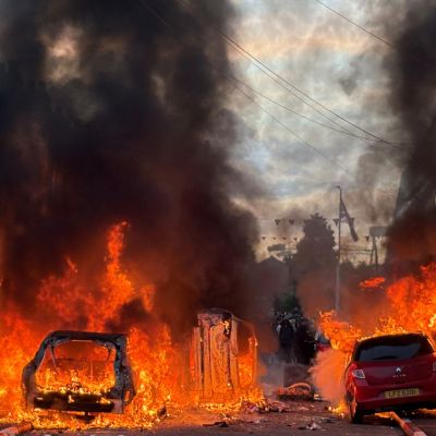 Irish Rioters Torch Cars as Brutal Stabbing Sparks Anti-Immigrant Protests