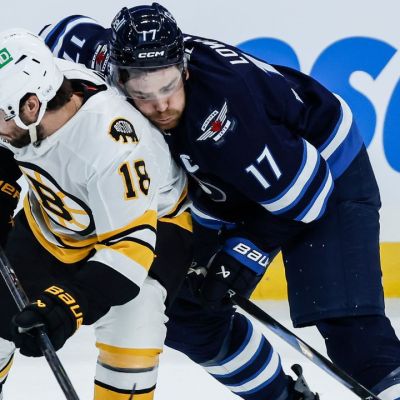 Jets lose in overtime to Bruins in season opener