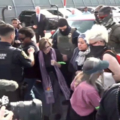 Agitators clash with police, arrests made as clergy members descend on Newark ICE facility