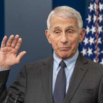 Fauci aide charged