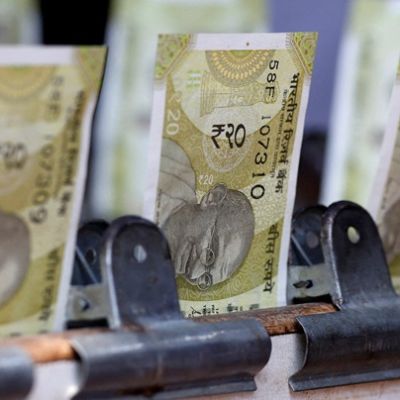 Rupee falls past 90 as outflows batter Asian laggard, RBI staggers defence