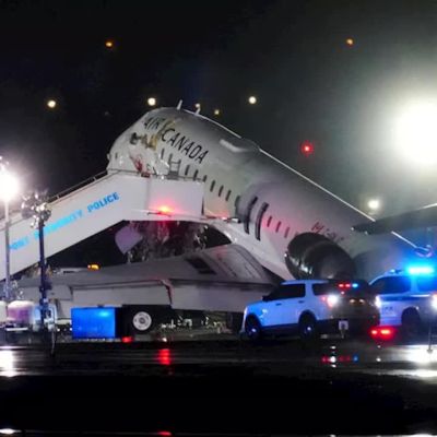 Seconds before LaGuardia crash, controller cleared fire truck to cross runway, NTSB says