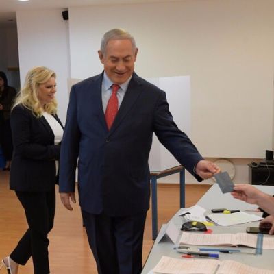 Israel's Netanyahu claims mandate for right-wing government as exit polls leave his bloc short of majority