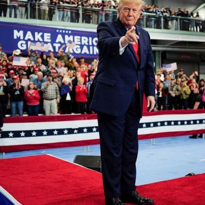 Trump signs pardons for Alaska diesel mechanics onstage during rally touting major energy deals