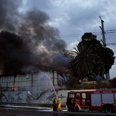 US bombs military sites on Iranian island as Trump threatens its...