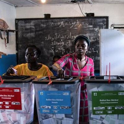Liberia football legend faces tight run-off to stay president