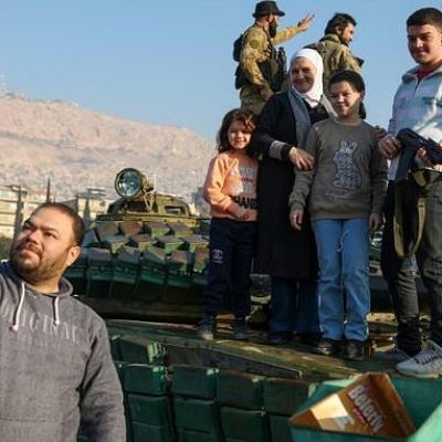 Syrians search for loved ones while rejoicing in Assad’s fall