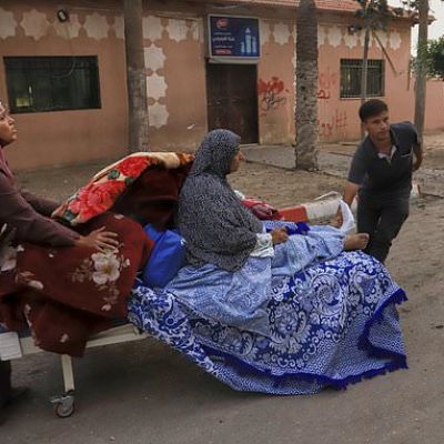 Israeli airstrikes in Gaza kill 48 people, including 22 children,…