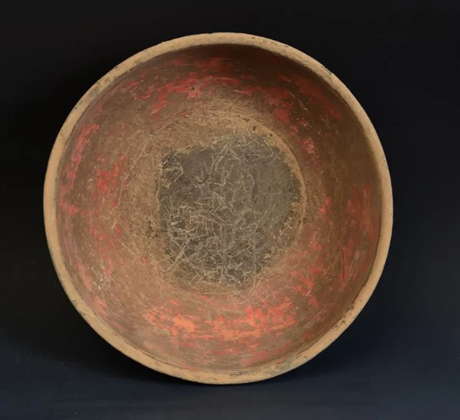 Archaeological pottery wok models from Han Dynasty tombs (200 BC - 200 AD) showing the earliest evidence of wok use