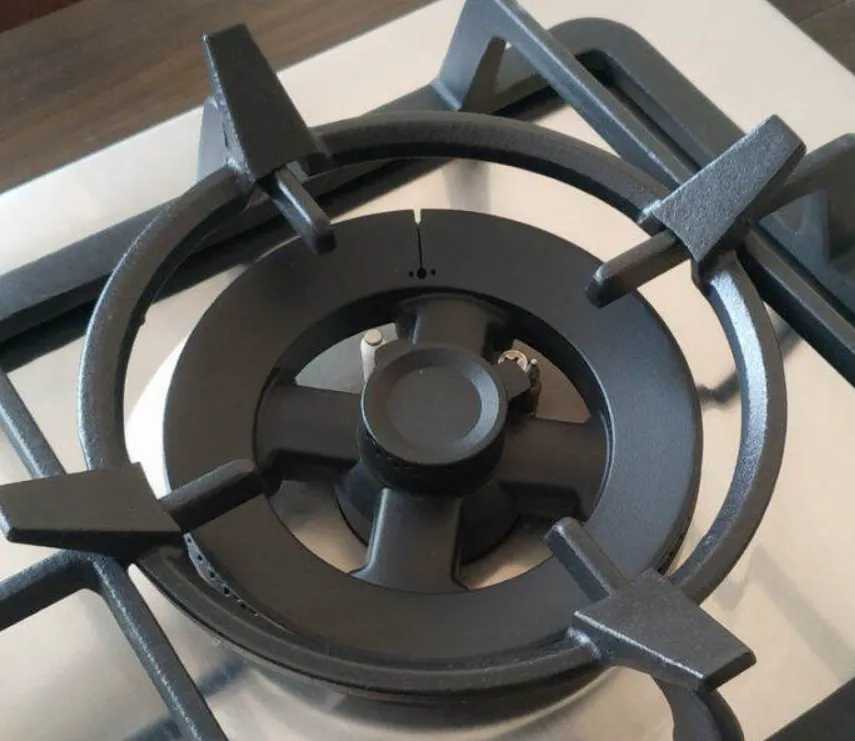 Gas stovetop with wok ring supporting round-bottom wok