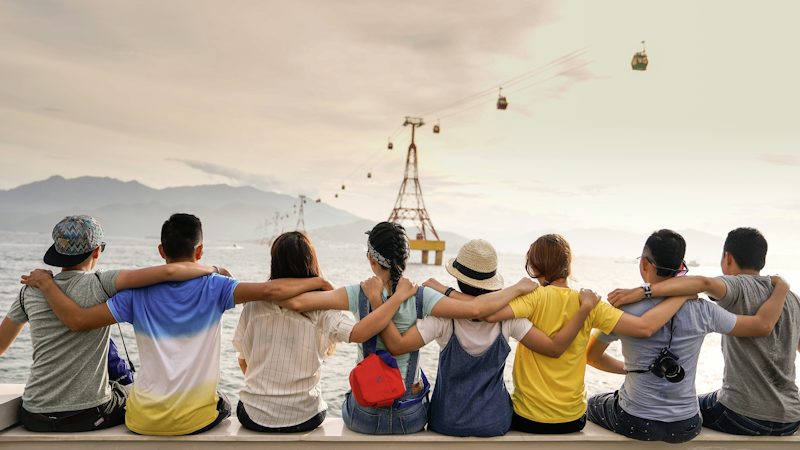 Diverse group of teenage friends together