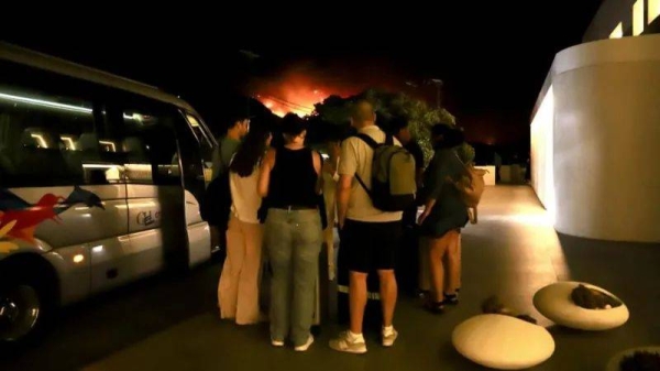 Mass-evacuations-as-wildfire-rages