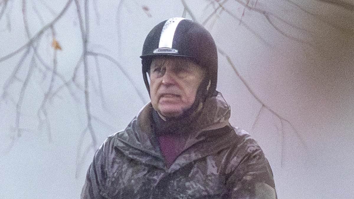 Soaked-Andrew-rides-alone-while