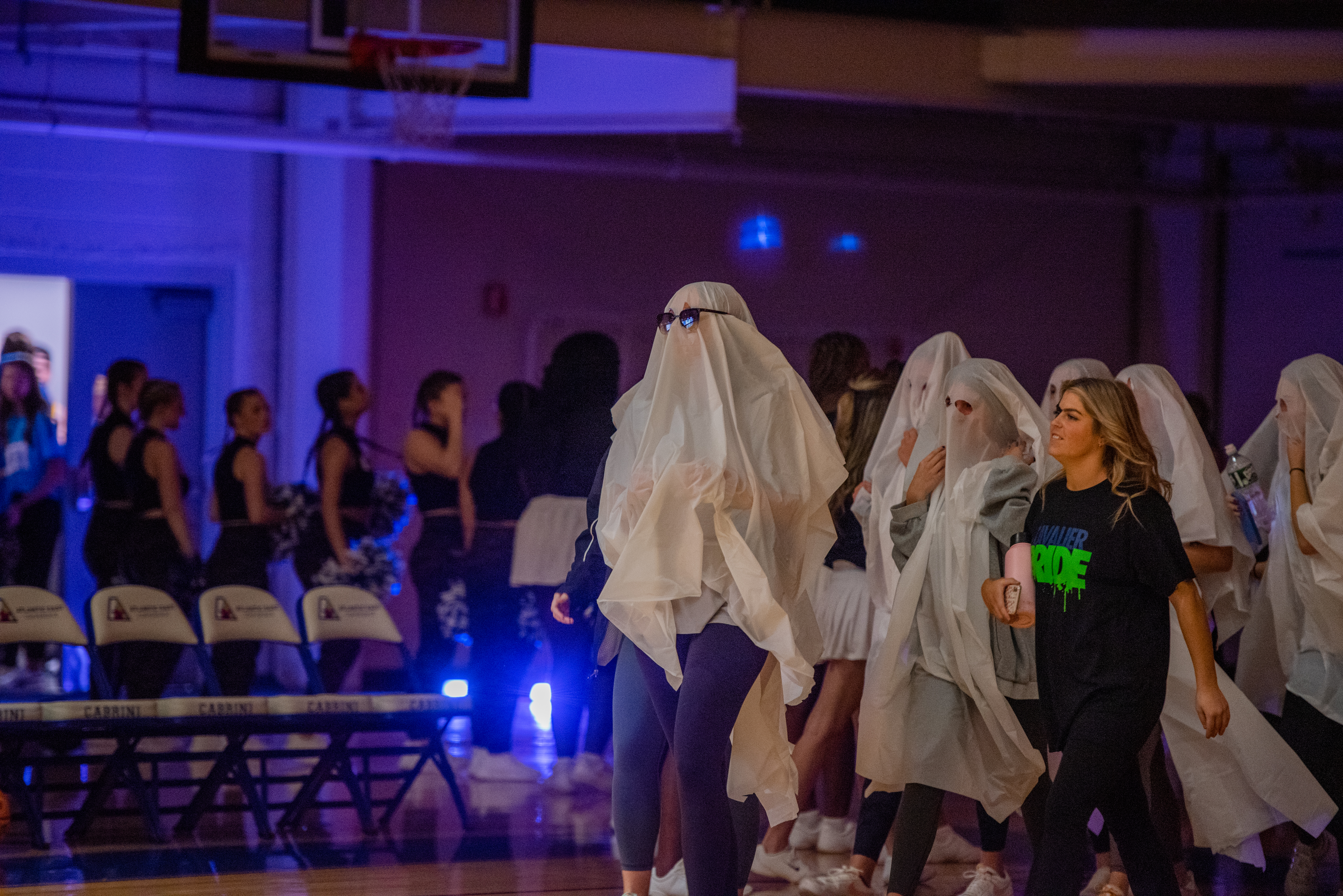 Participants dressed as ghosts at Halloween Havoc 2022.