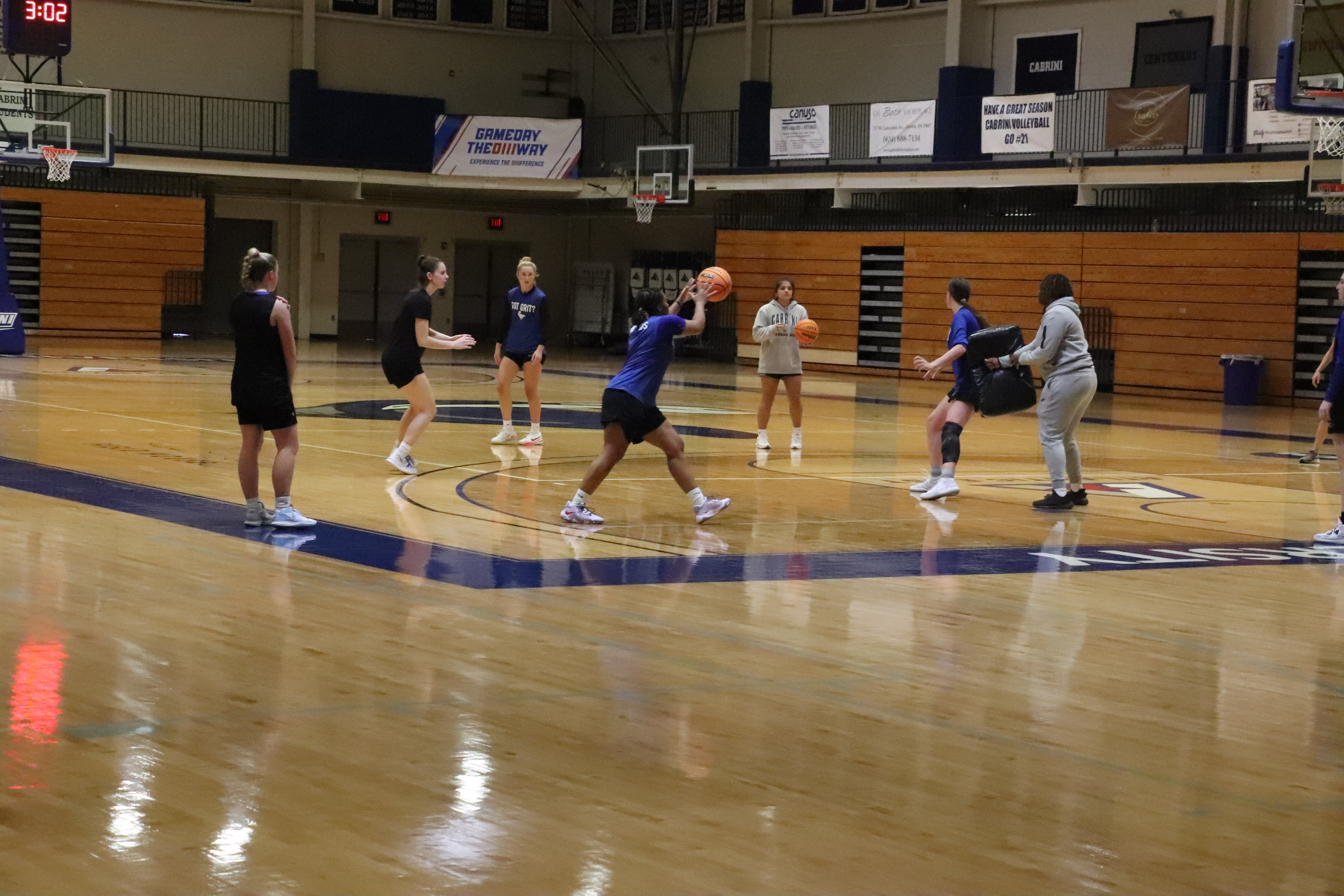 The Cabrini women's basketball team practices in the Dixon gym.