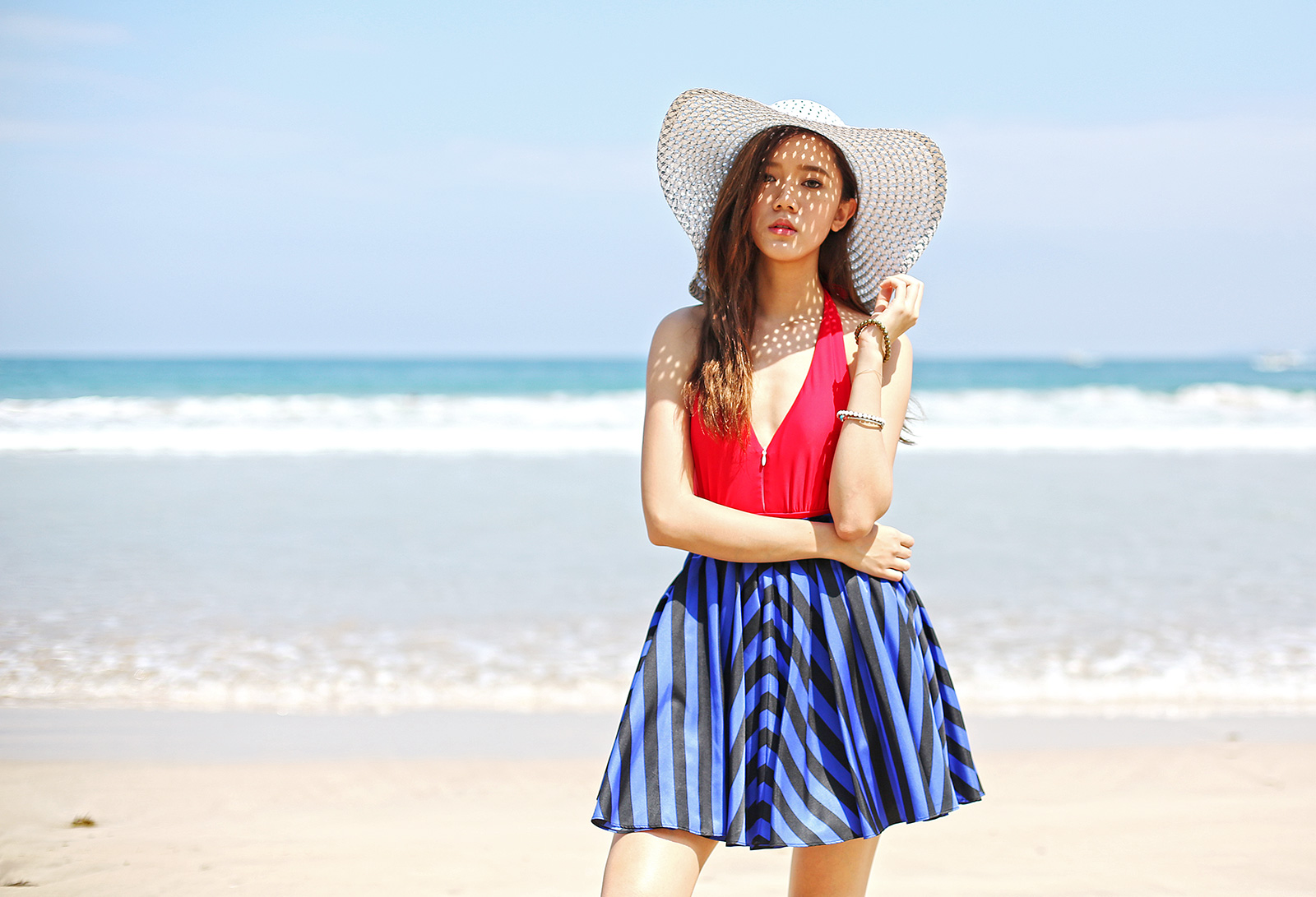 Soak Swimwear swimsuit, CPS skirt, Vince Camuto sandals, SM Accessories floppy hat | www.itscamilleco.com