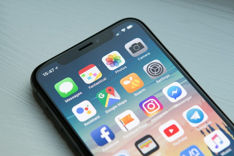 Phone set aside on a family table at home
