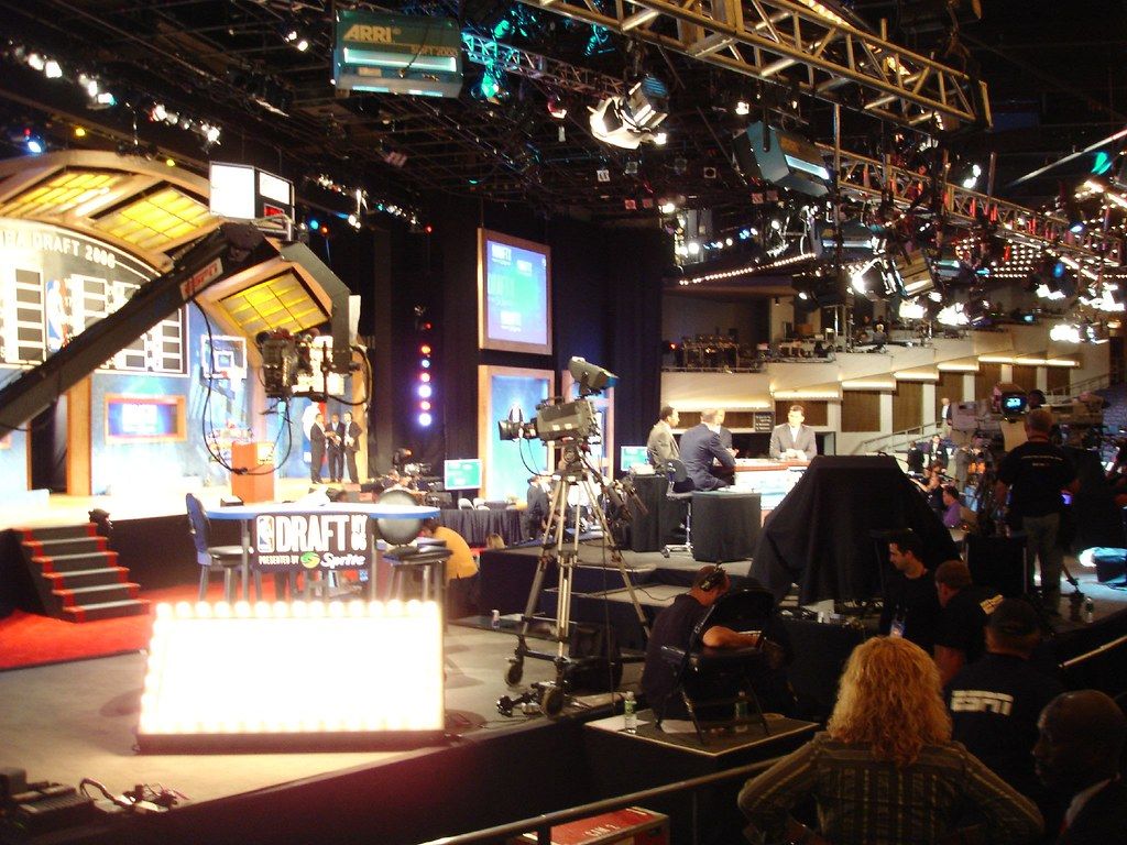 People setting up the production for a sunday football broadcast. Photo by farlane.