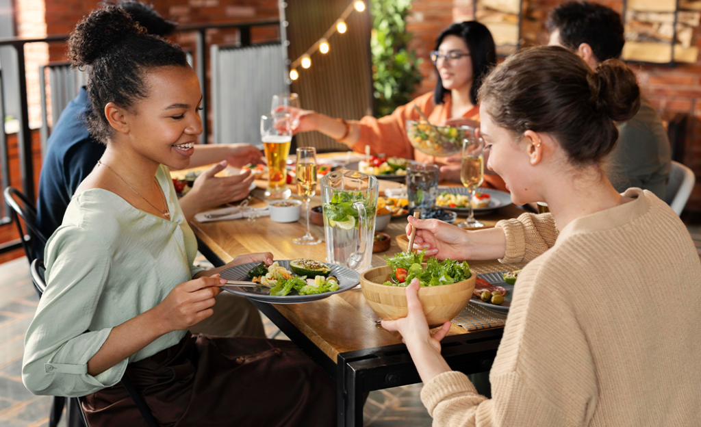 Toyota Dealer Near Brookville | Group of friends eating together for dinner