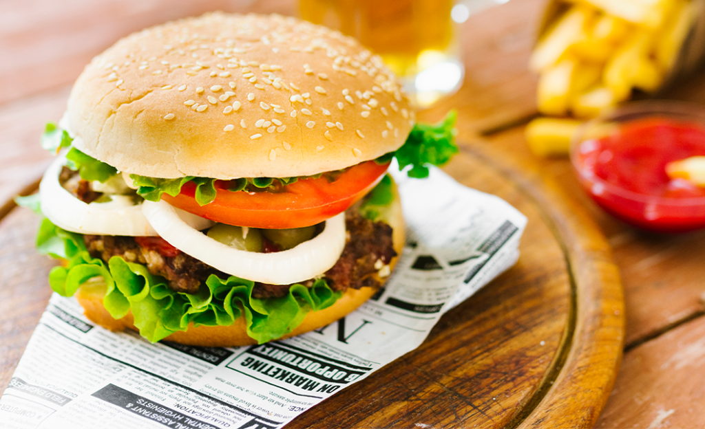 Toyota Dealer Near St Marys | Close up of burger and fries at diner 