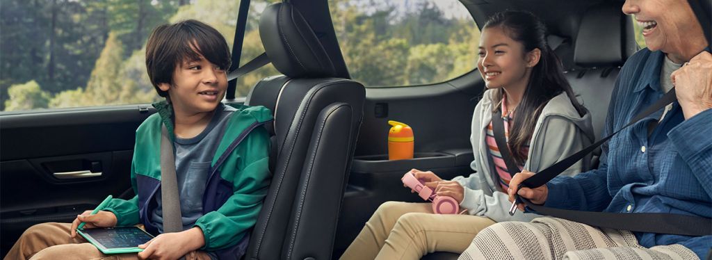 2025 Toyota Grand Highlander at Delaney Toyota of DuBois in DuBois, PA | family sitting in the back seats of a 2025 Toyota Grand Highlander