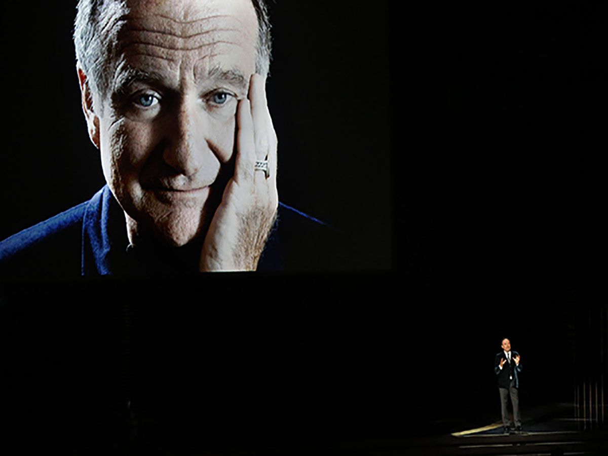 Comedian Billy Crystal, bottom right, pays tribute to the late Robin Williams during the 66th Annual Primetime Emmy Awards at Nokia Theatre at L.A. Live in Los Angeles on Monday, Aug. 25, 2014. (Robert Gauthier/Los Angeles Times/MCT)