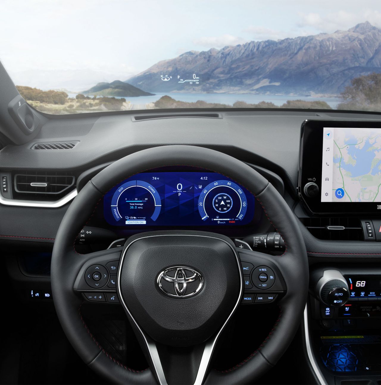2025 Toyota RAV4 vs 2025 Subaru Forester comparison | Bobby Rahal Toyota | Interior of a 2025 RAV4 with views of the mountains