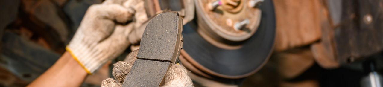 Brake replacement and Safety at Delaney Chevrolet of Greensburg | close up of a used brake pad