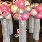gray-pink-white-balloons-on-table