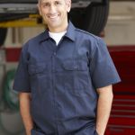 Should Your Business Lease Your Next Work Truck? happy-auto-shop-owner