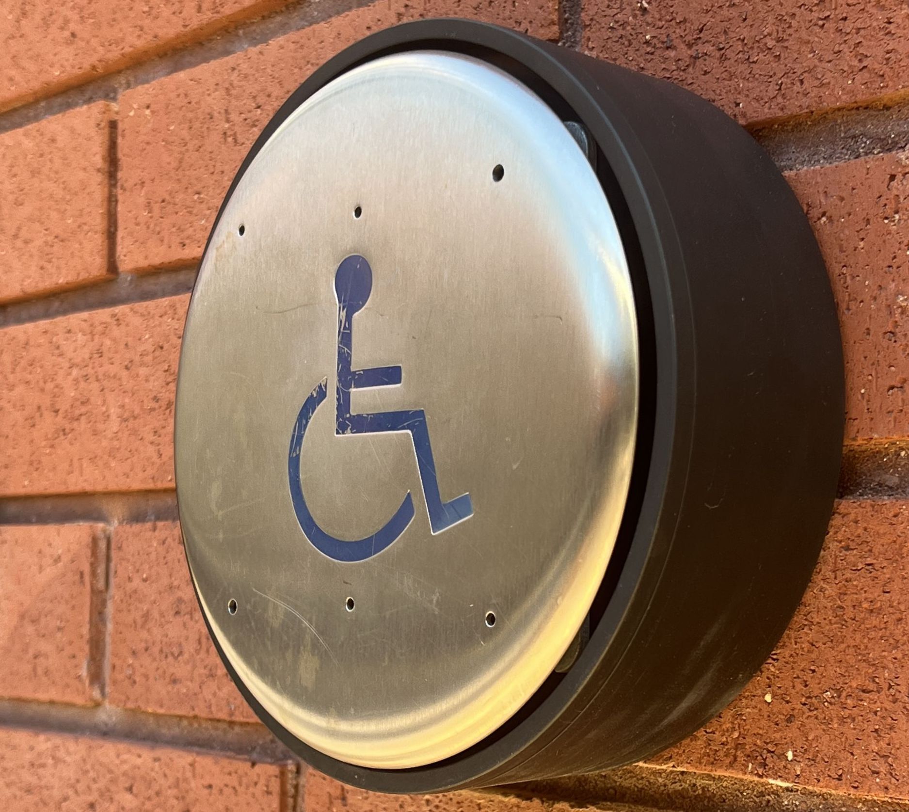 Handicap button outside of Radnor Township municipal building. Photo by Thomas Ryan