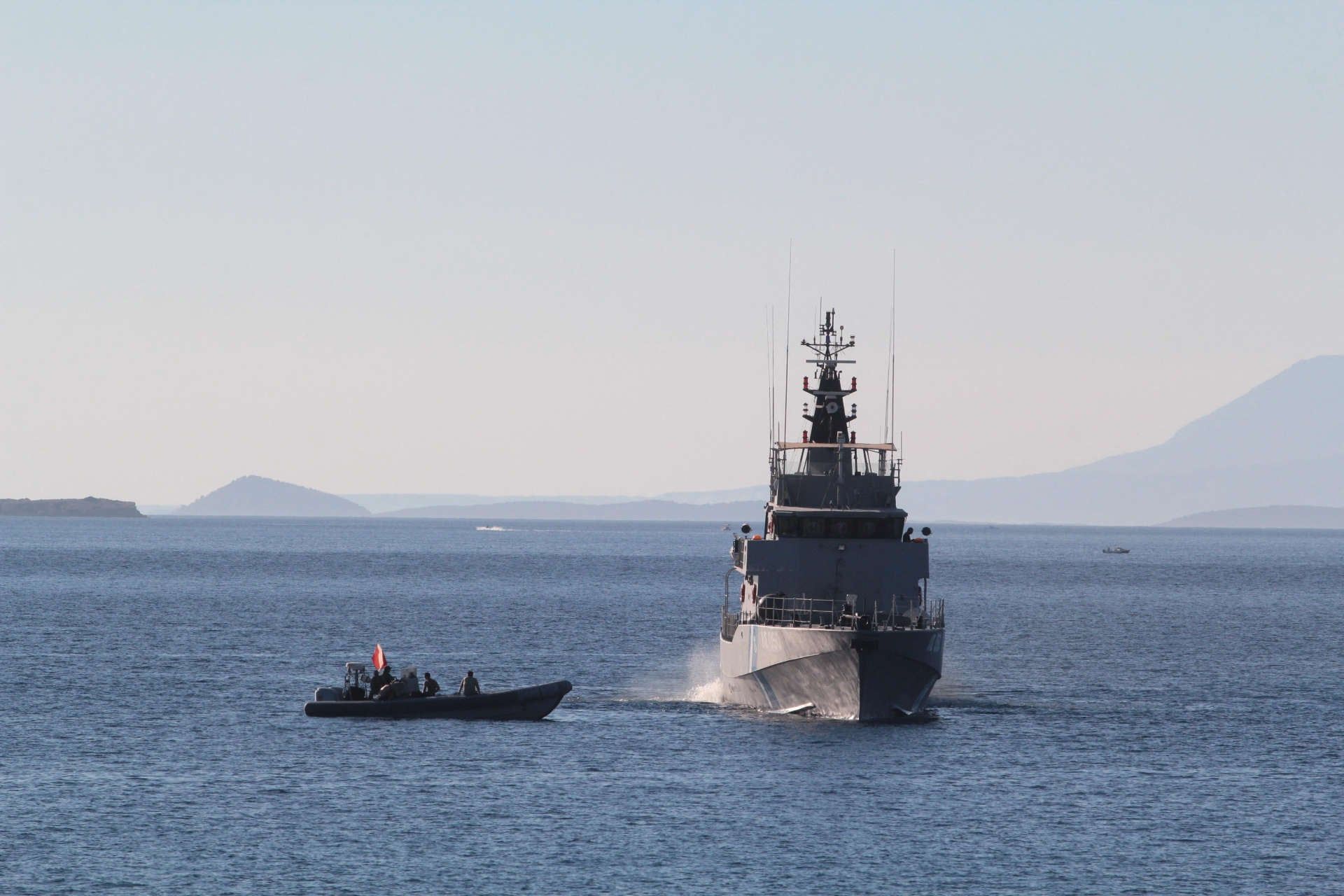 Coastguard rescue 52 migrants off Greece, boy missing