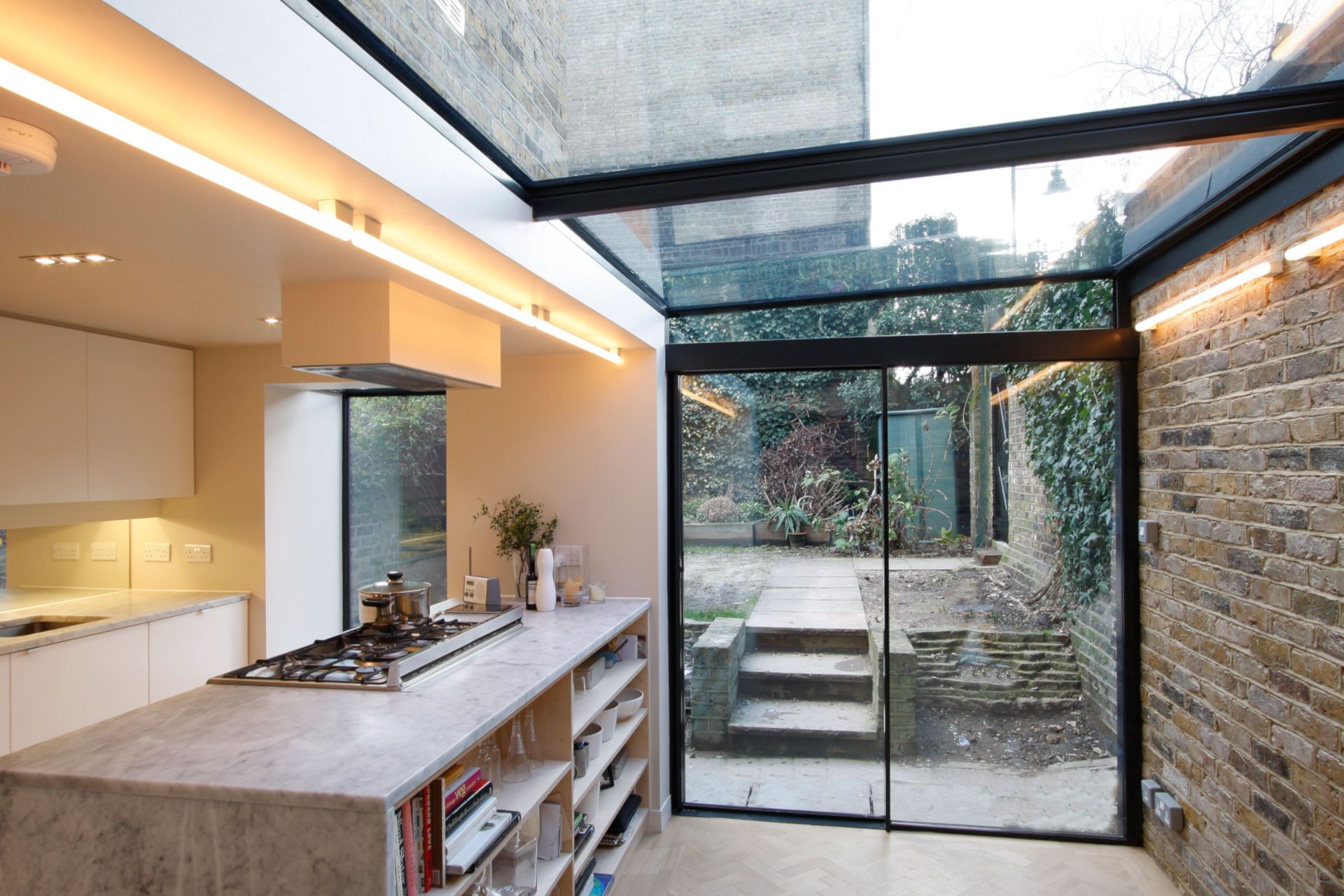 Create a bright side infill extension with minimal windows minimal