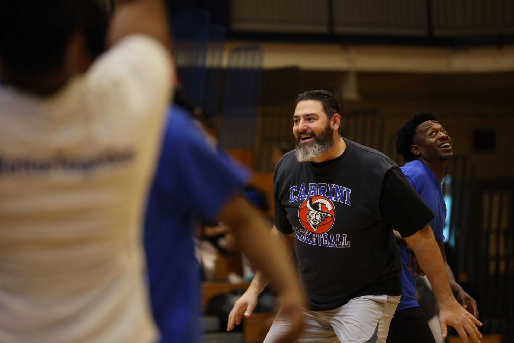 All smiles for players on the court. Photo by Samantha Taddei.