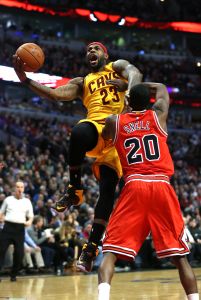 MCT Cavaliers forward LeBron James and Bulls guard Tony Snell. 