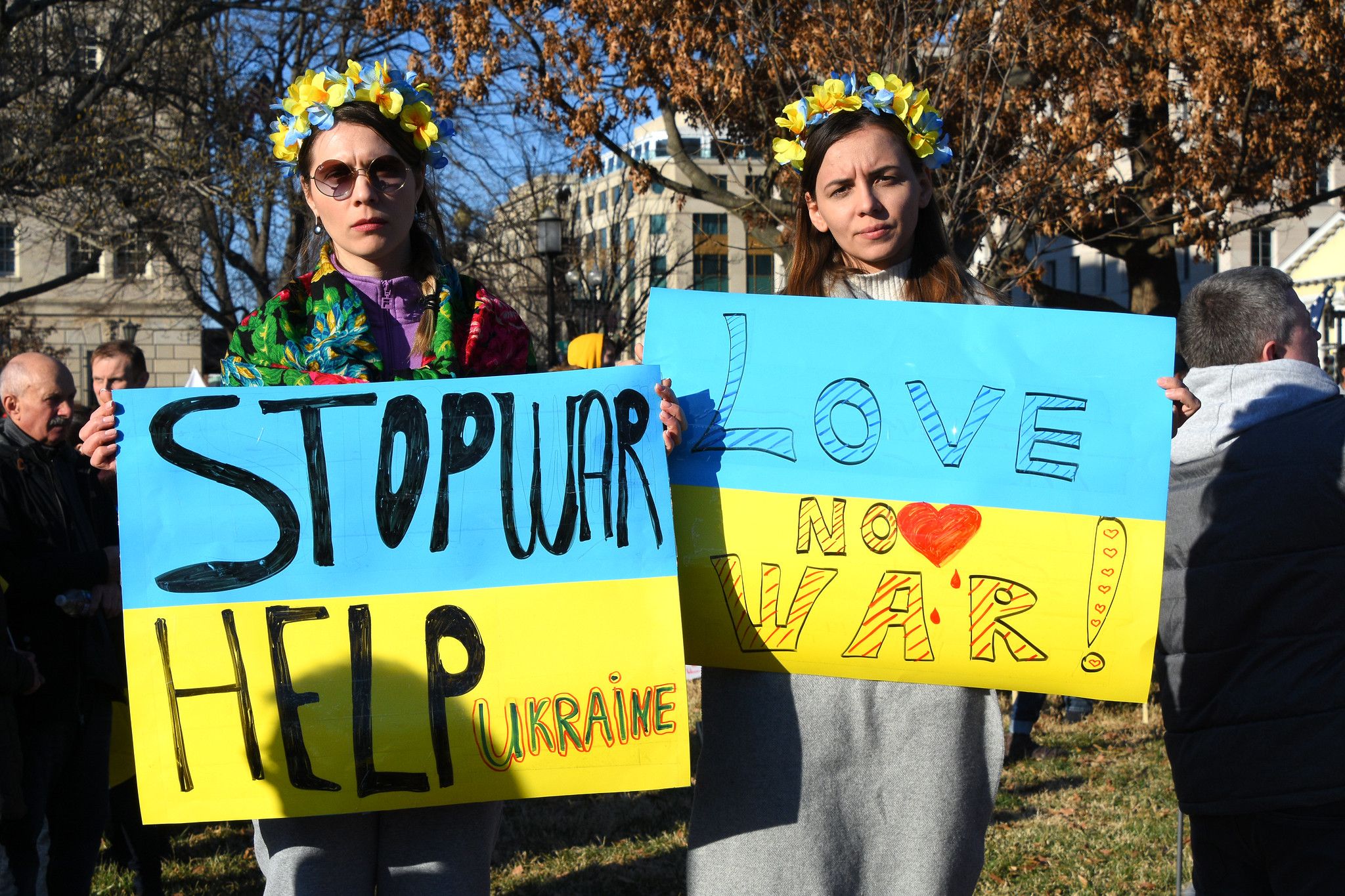 Two individuals protesting the war in Ukraine. Photo by Amaury Laporte from Creative commons/WikiMedia.
