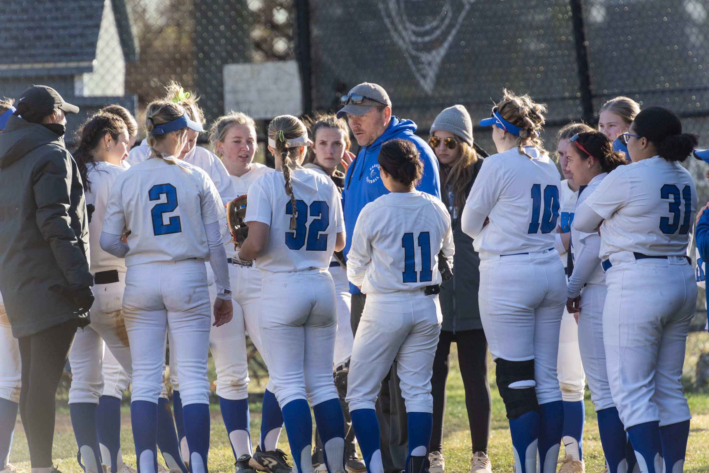 Head Coach Chris Protesto meets with his team during their home opener against Haverford. Protesto has been on the Cavaliers coaching staff since 2019 and helped the team win the 2022 Atlantic East Championship, their first since 2004. Photo by Linda Johnson from Cabrini Athletics.