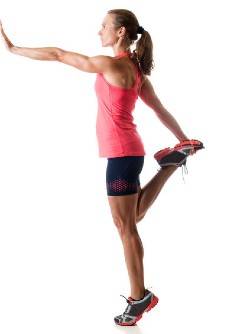 A woman doing a single leg calf raise