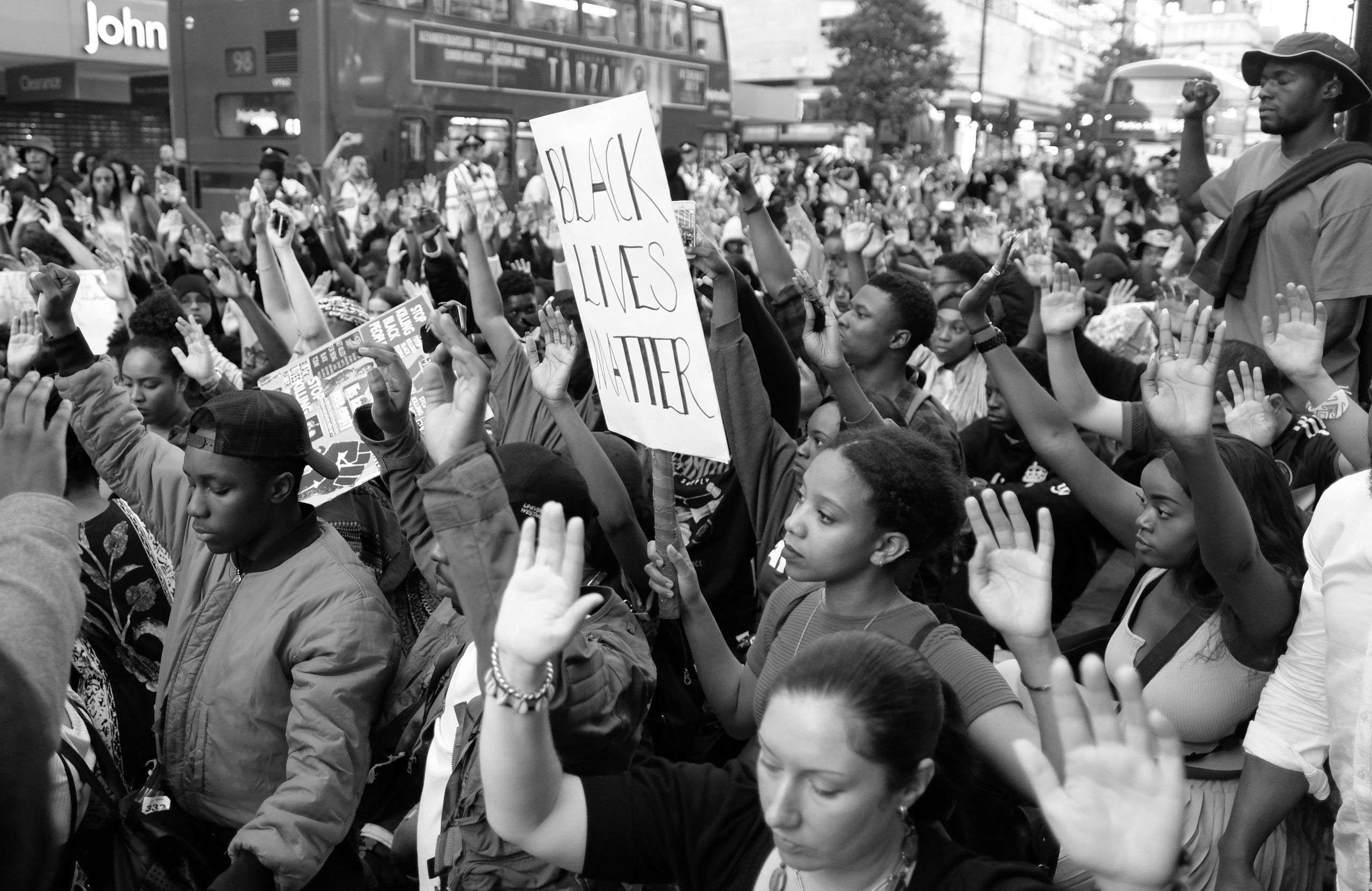 Protest for racial justice. Photo by Alisdare Hickson from CreativeCommons.