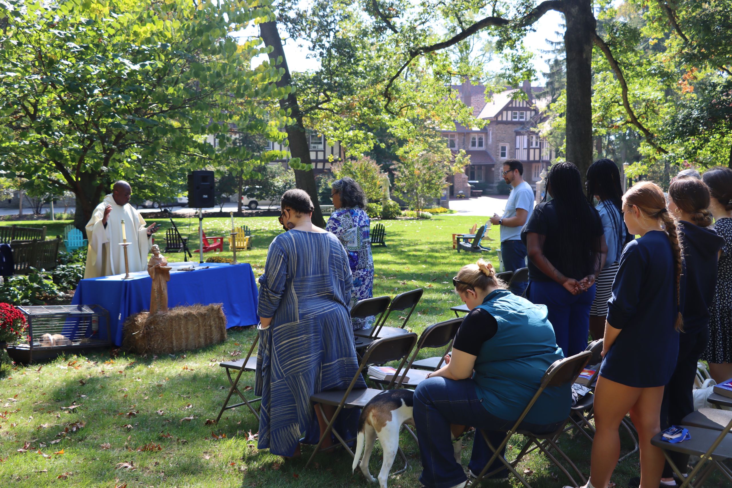 St. Francis mass and blessing of the animals by the Commons Peace Pole. Photo by Emily Shultz