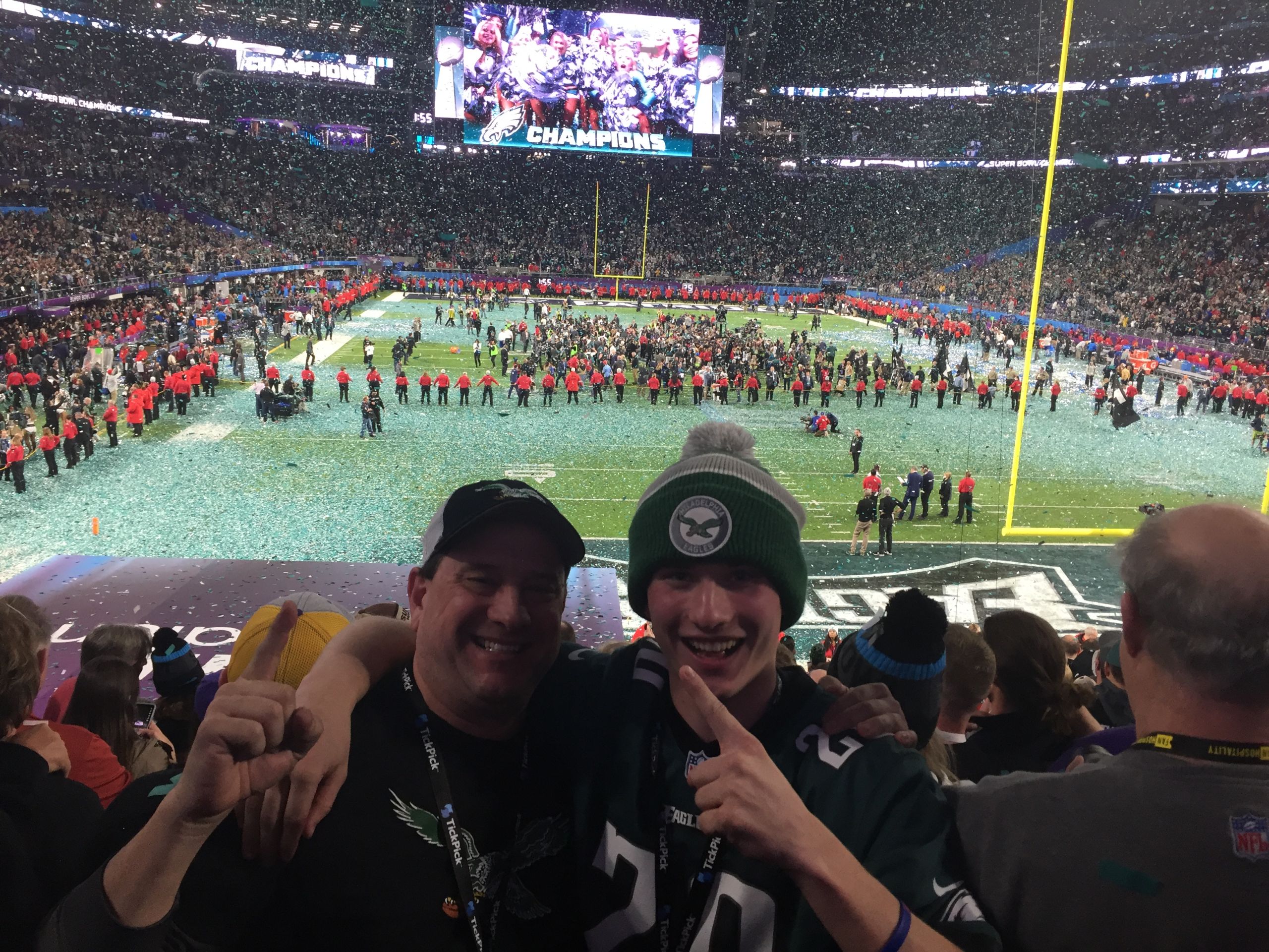 Senior communications major, John Rader, and his father, celebrate the victory. Photo from John Rader.