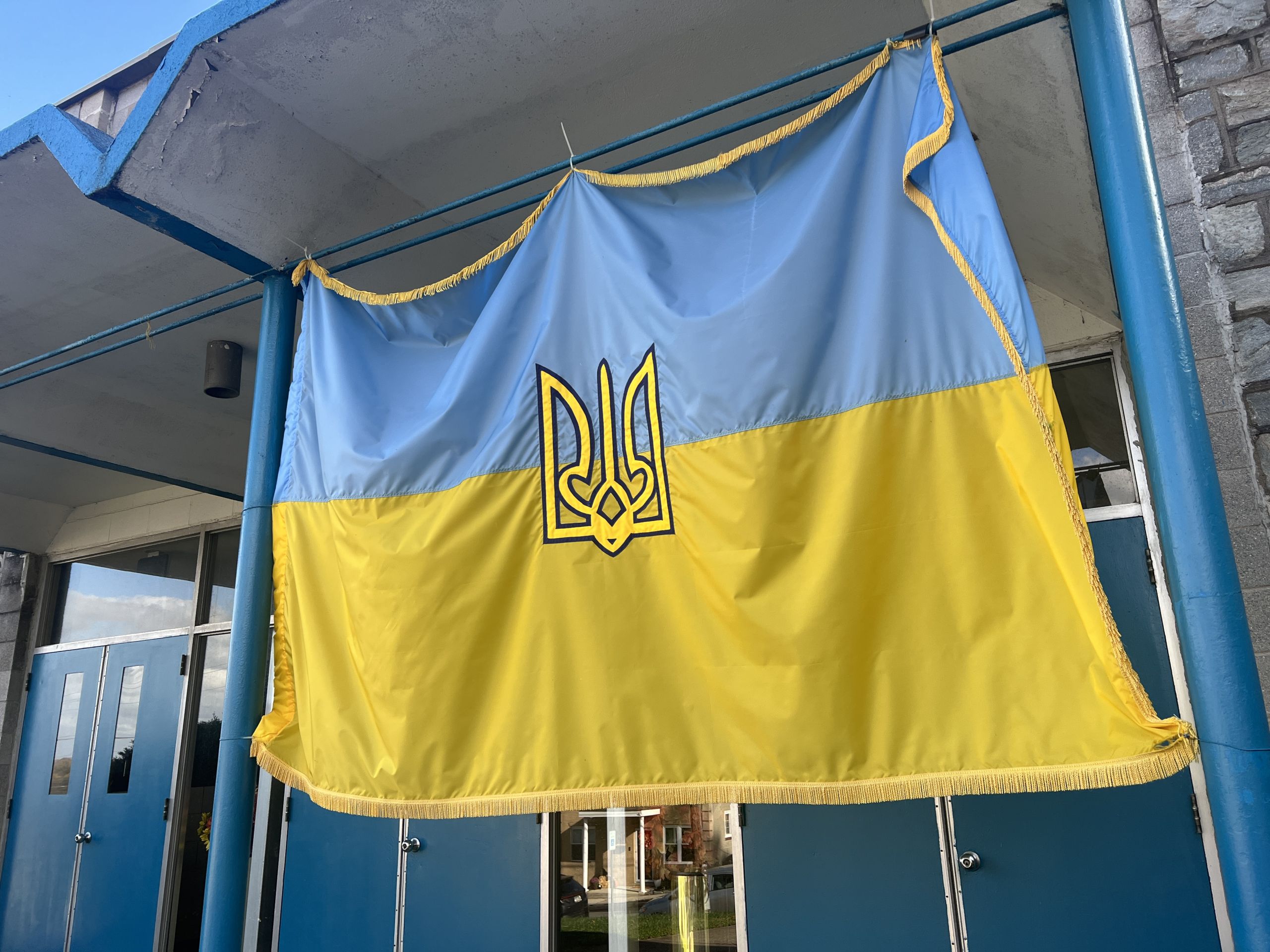 Ukrainian flag outside of St. Peter and Paul's Ukrainian church. Photo by Thomas Ryan.