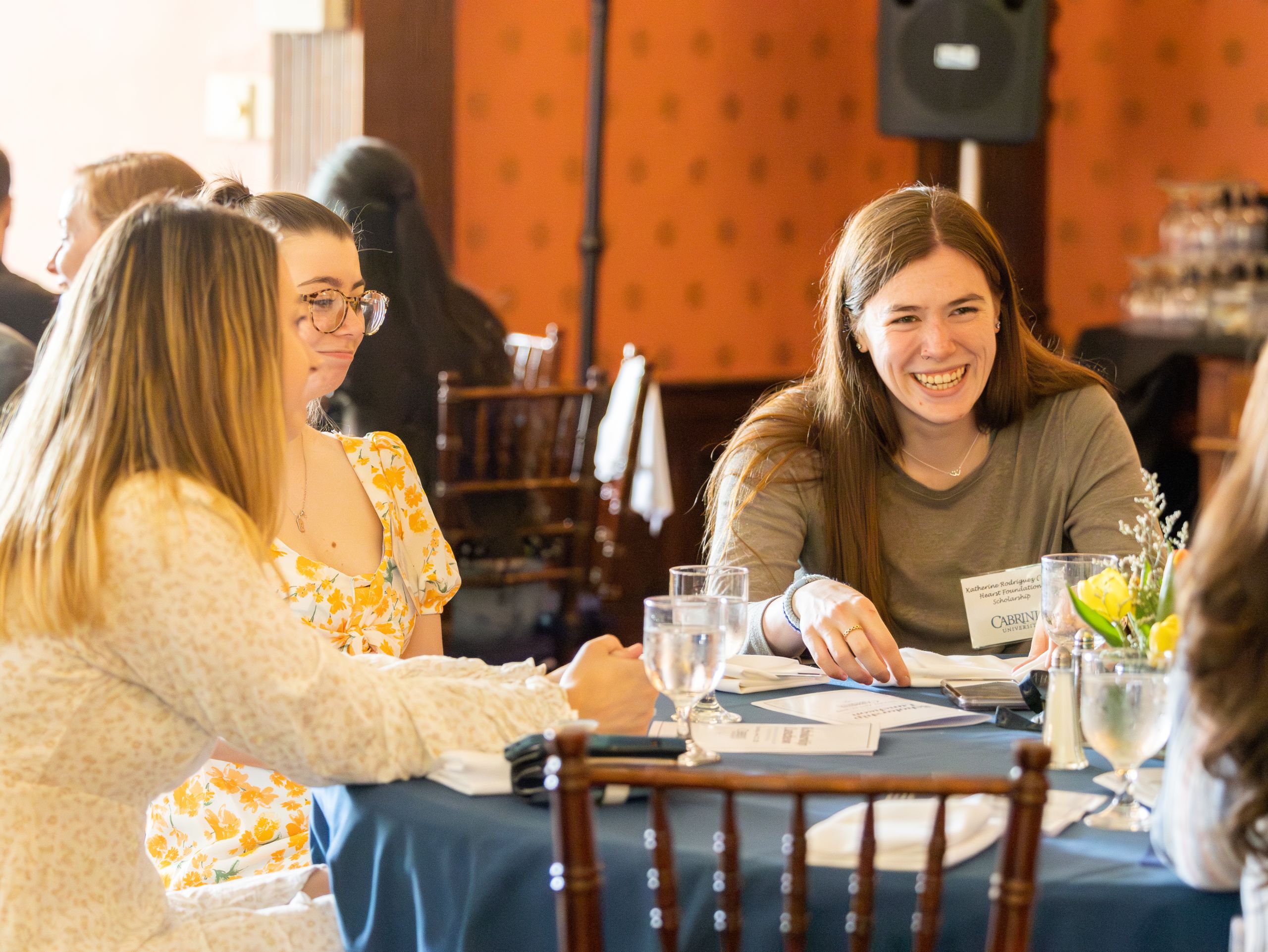 Students celebrate their academic success at the scholarship luncheon in spring 2023. Photo via Cabrini University Flickr