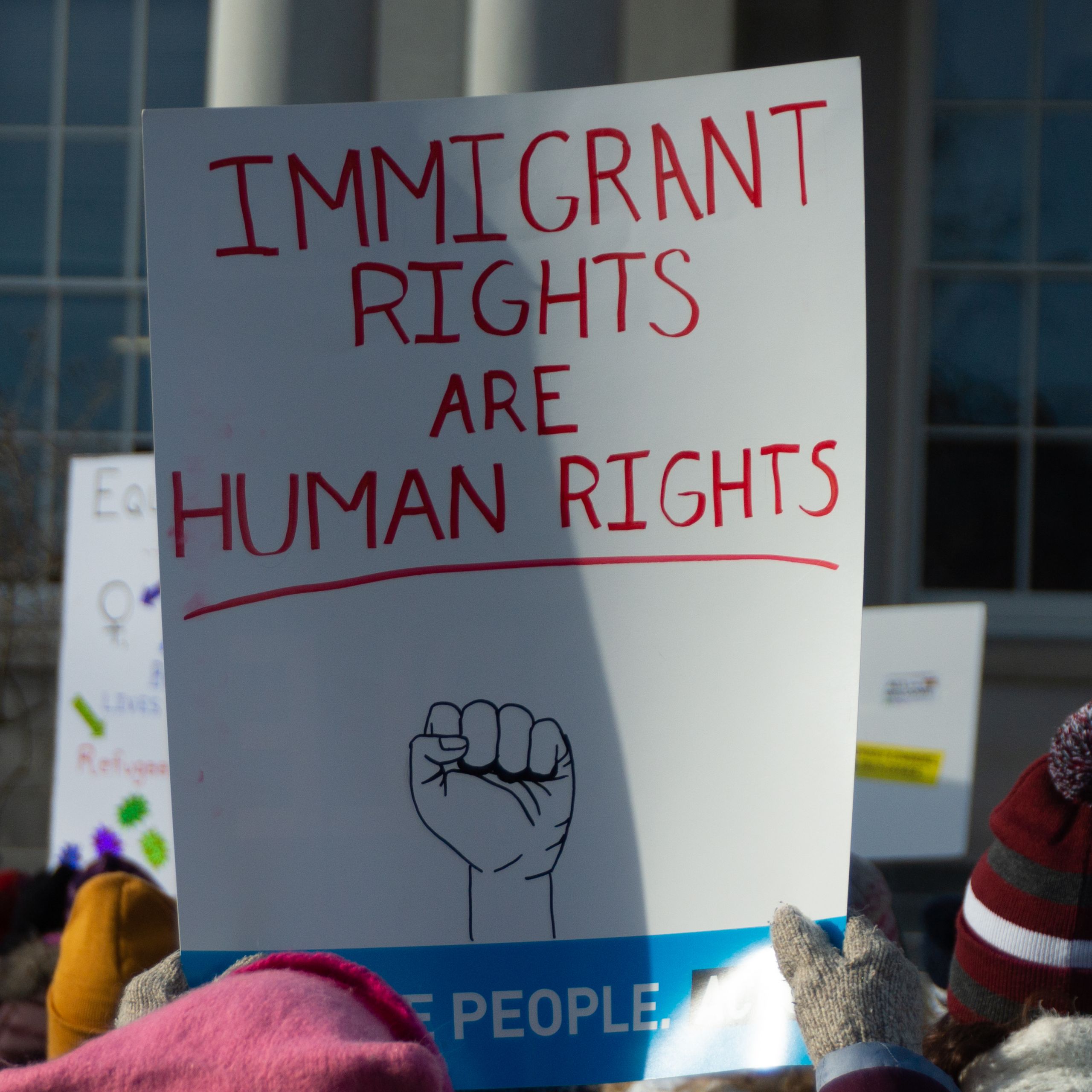 Sign protests in advocacy for immigration rights. Photo by Marc Nozell via Creative Commons.